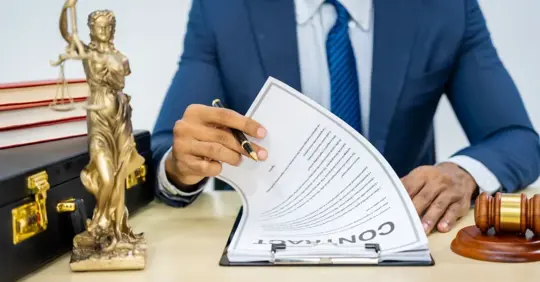 lawyer scanning a contract